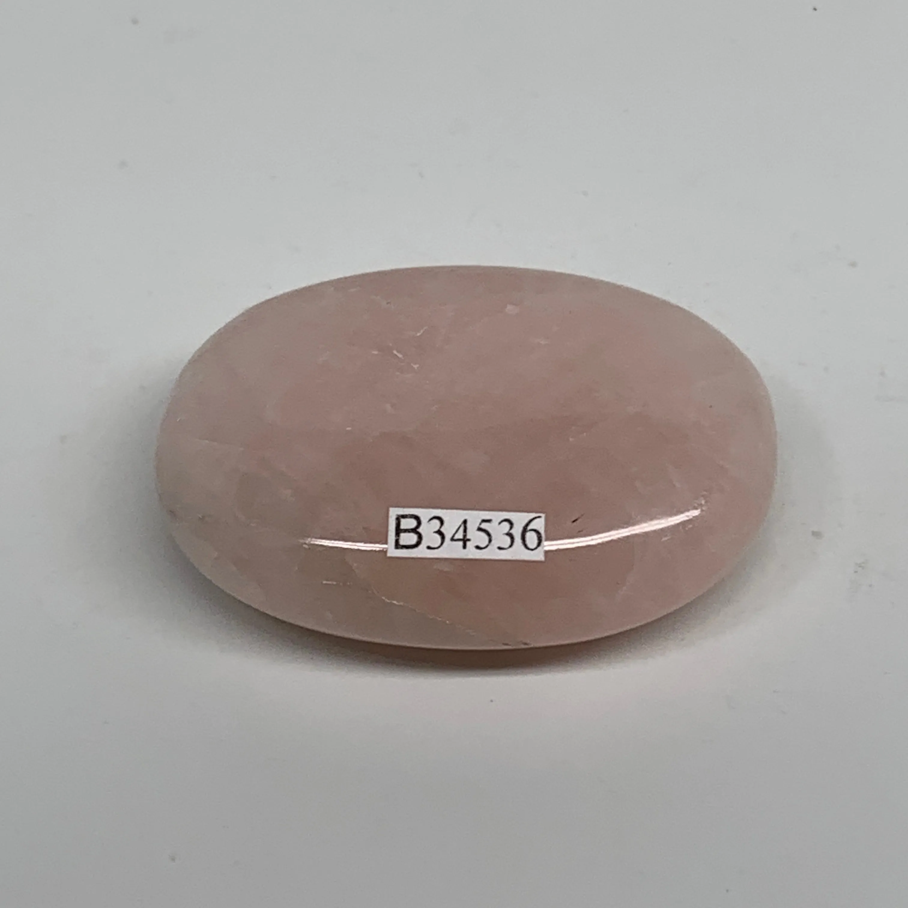 68.2g , 2.2"x1.6"x0.7", Natural Pink Rose Quartz Palm-stone Crystal, B34536