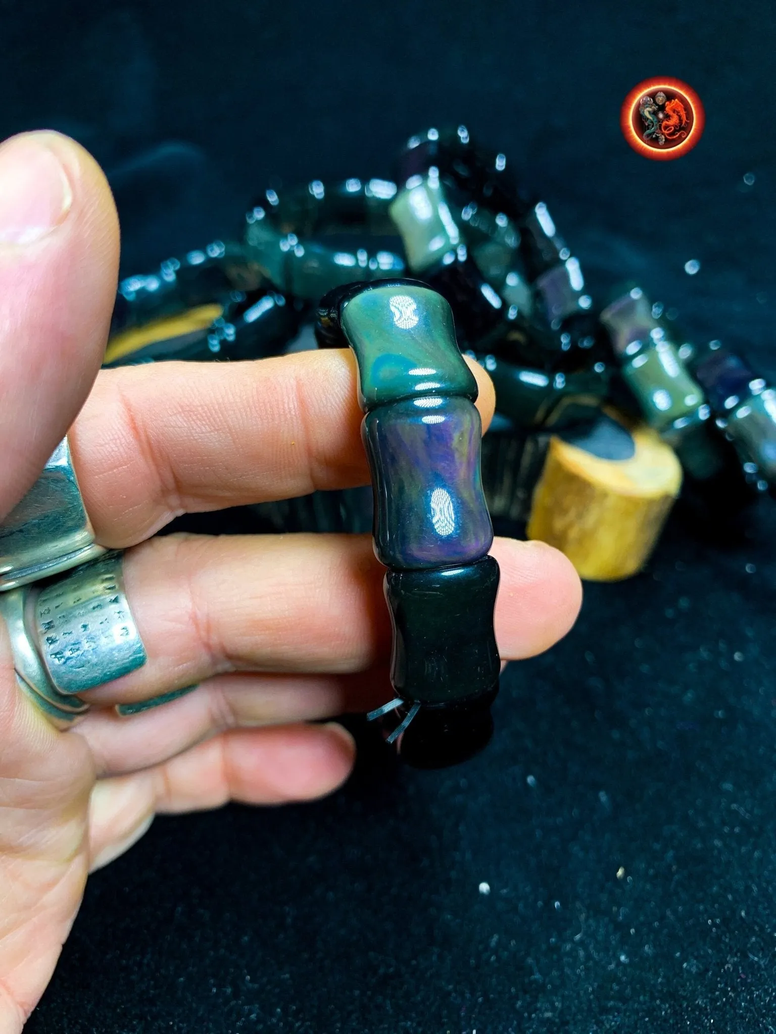 bracelet en obsidienne oeil celeste d'excellente qualité. taille bambou 15 sur 13 sur 9mm. Originaire du Mexique, naturelle et expertisée.