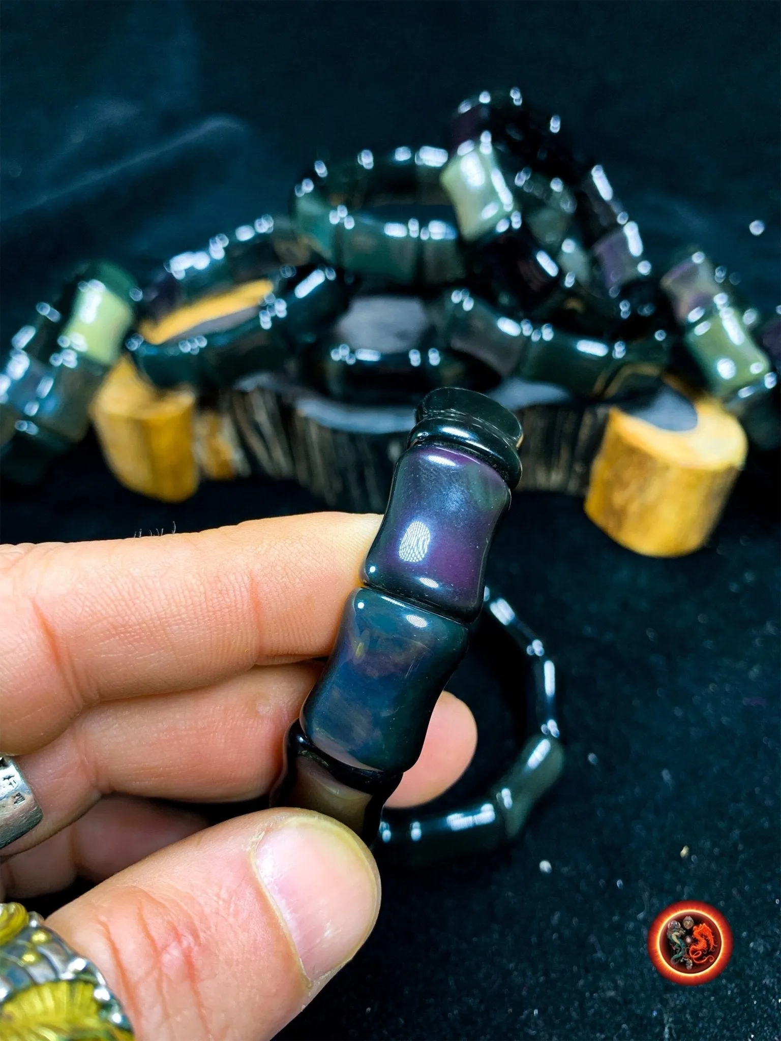 bracelet en obsidienne oeil celeste d'excellente qualité. taille bambou 15 sur 13 sur 9mm. Originaire du Mexique, naturelle et expertisée.