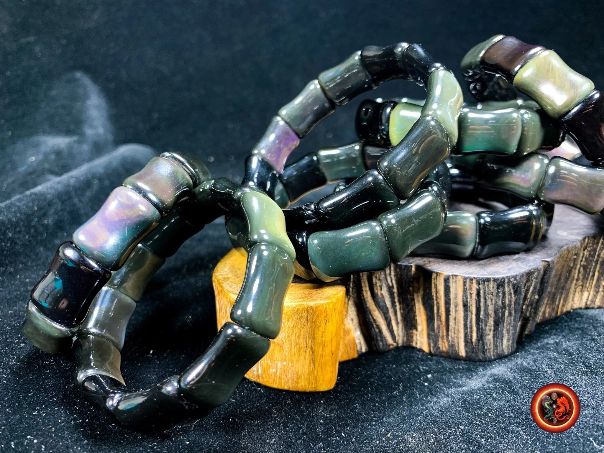 bracelet en obsidienne oeil celeste d'excellente qualité. taille bambou 15 sur 13 sur 9mm. Originaire du Mexique, naturelle et expertisée.