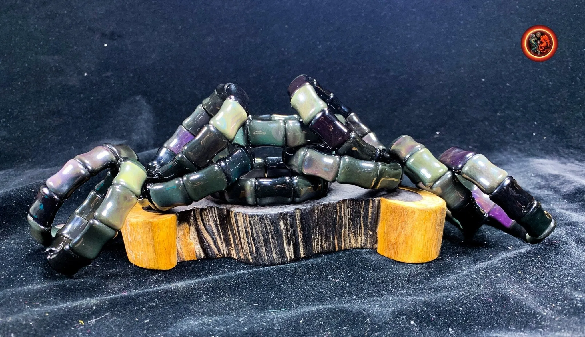 bracelet en obsidienne oeil celeste d'excellente qualité. taille bambou 15 sur 13 sur 9mm. Originaire du Mexique, naturelle et expertisée.