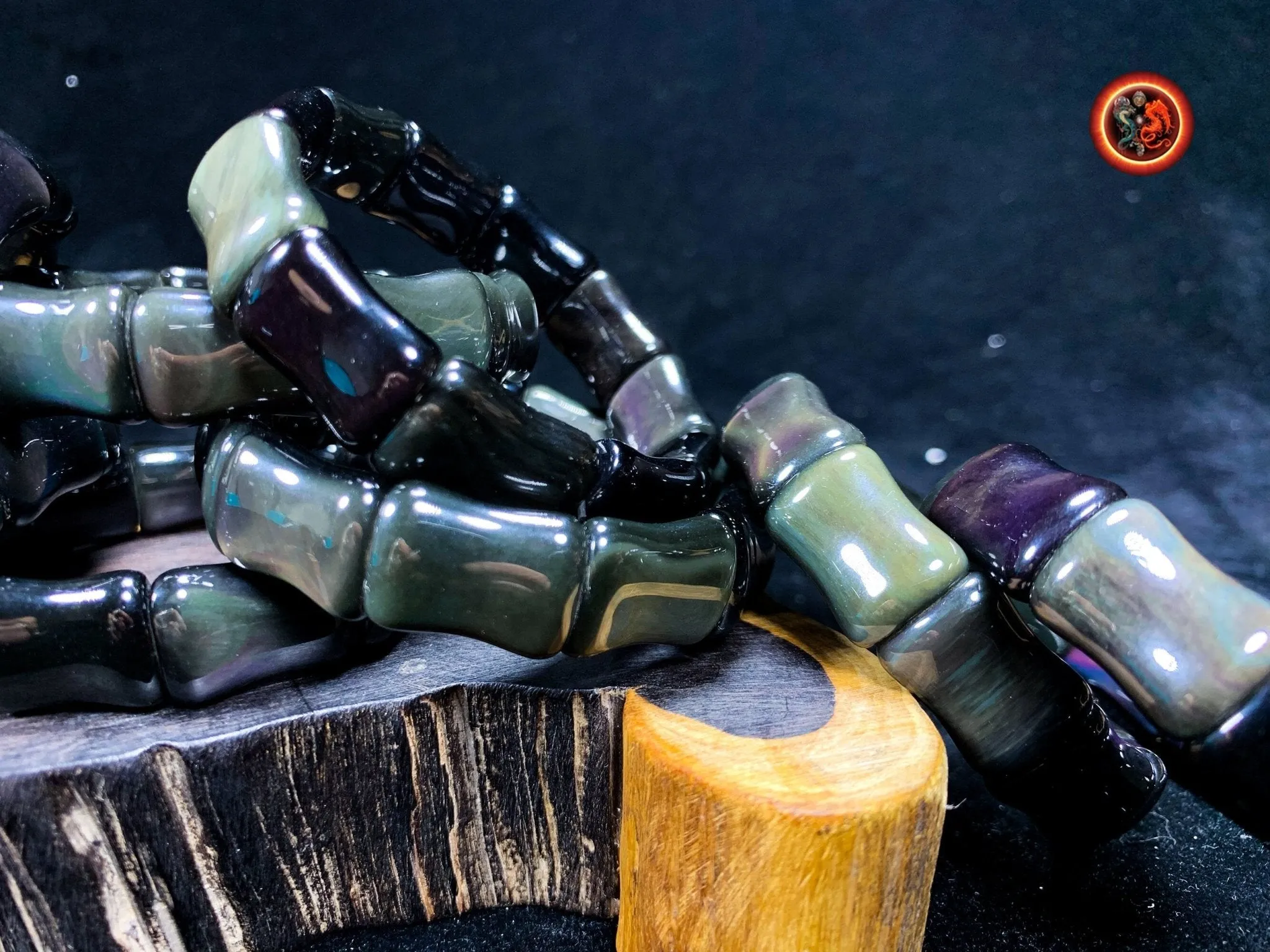 bracelet en obsidienne oeil celeste d'excellente qualité. taille bambou 15 sur 13 sur 9mm. Originaire du Mexique, naturelle et expertisée.