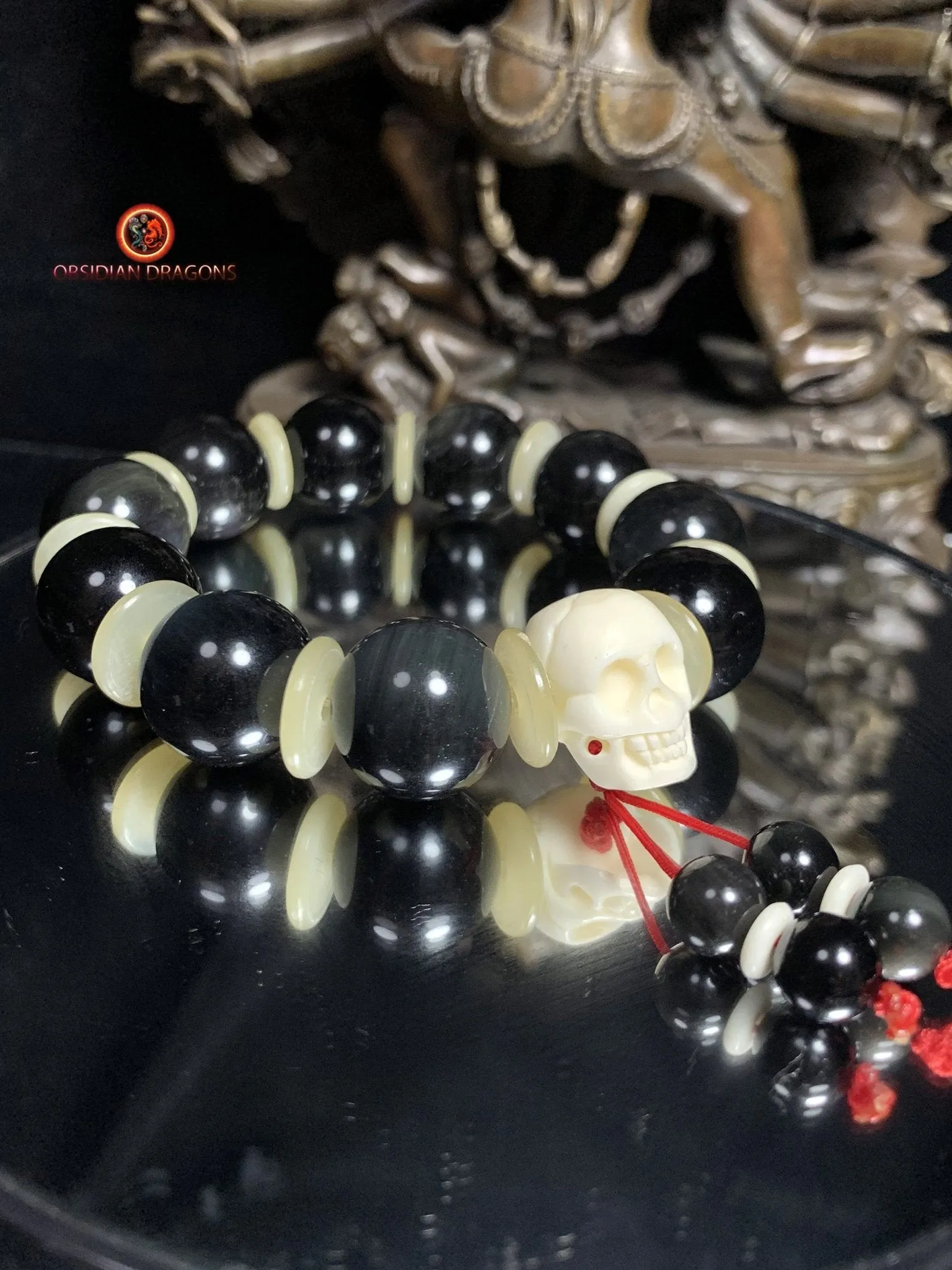 Bracelet en obsidienne oeil céleste artisanal- crâne sculpté