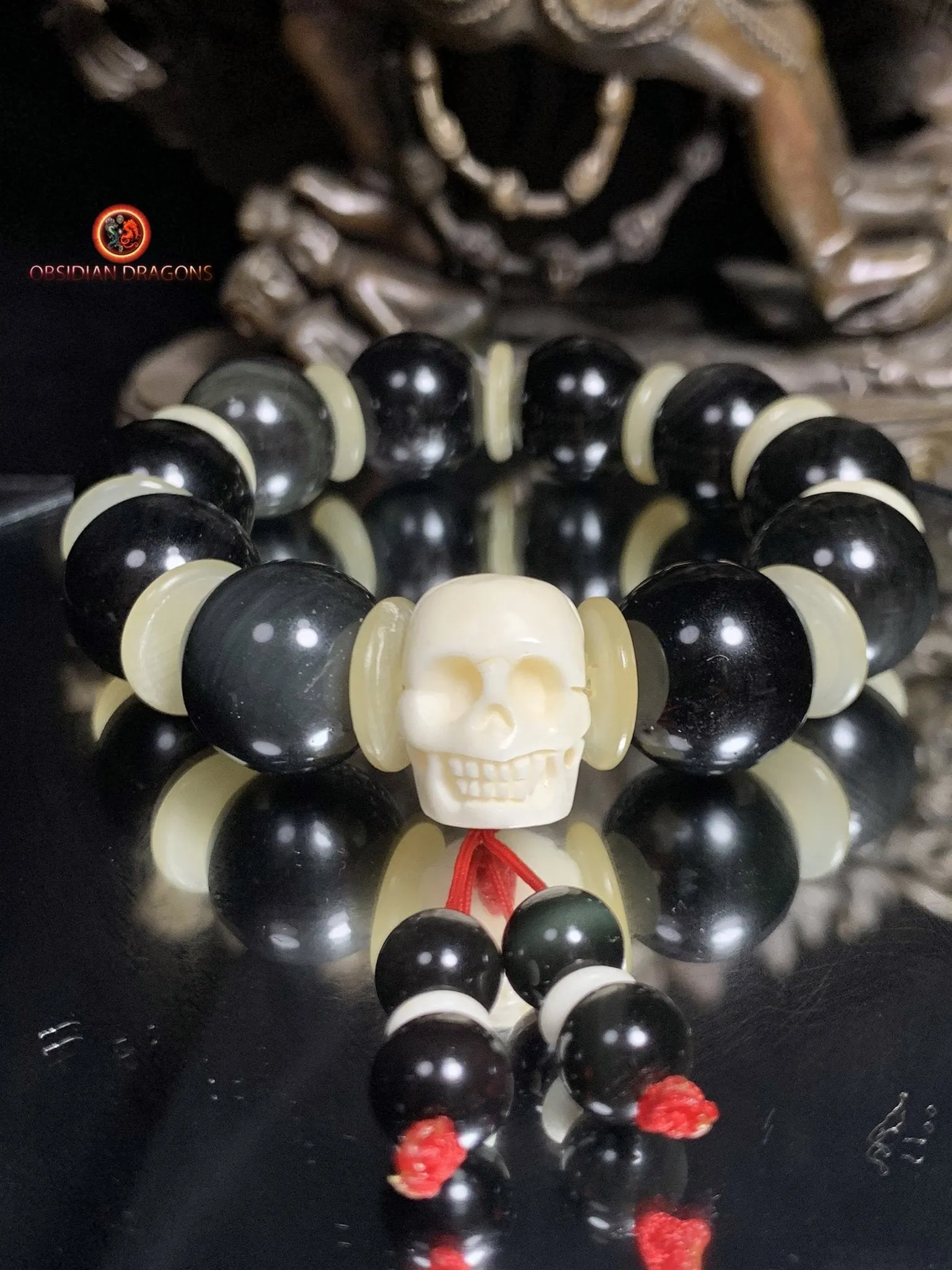 Bracelet en obsidienne oeil céleste artisanal- crâne sculpté