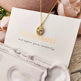 Oval Cross Necklace