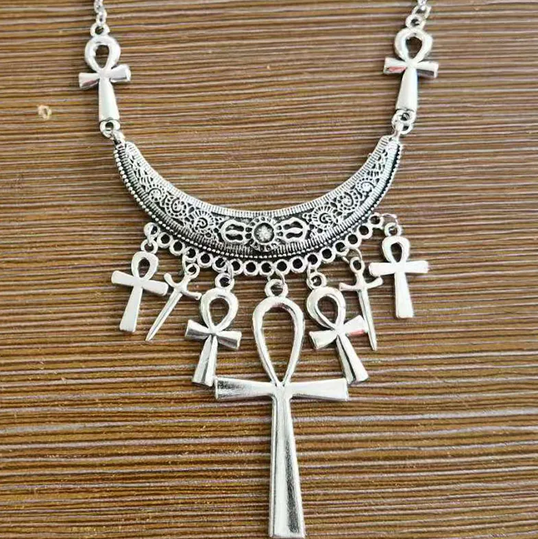 Silver Colored Necklace w/ Multi Hanging Ankh and Dagger Details